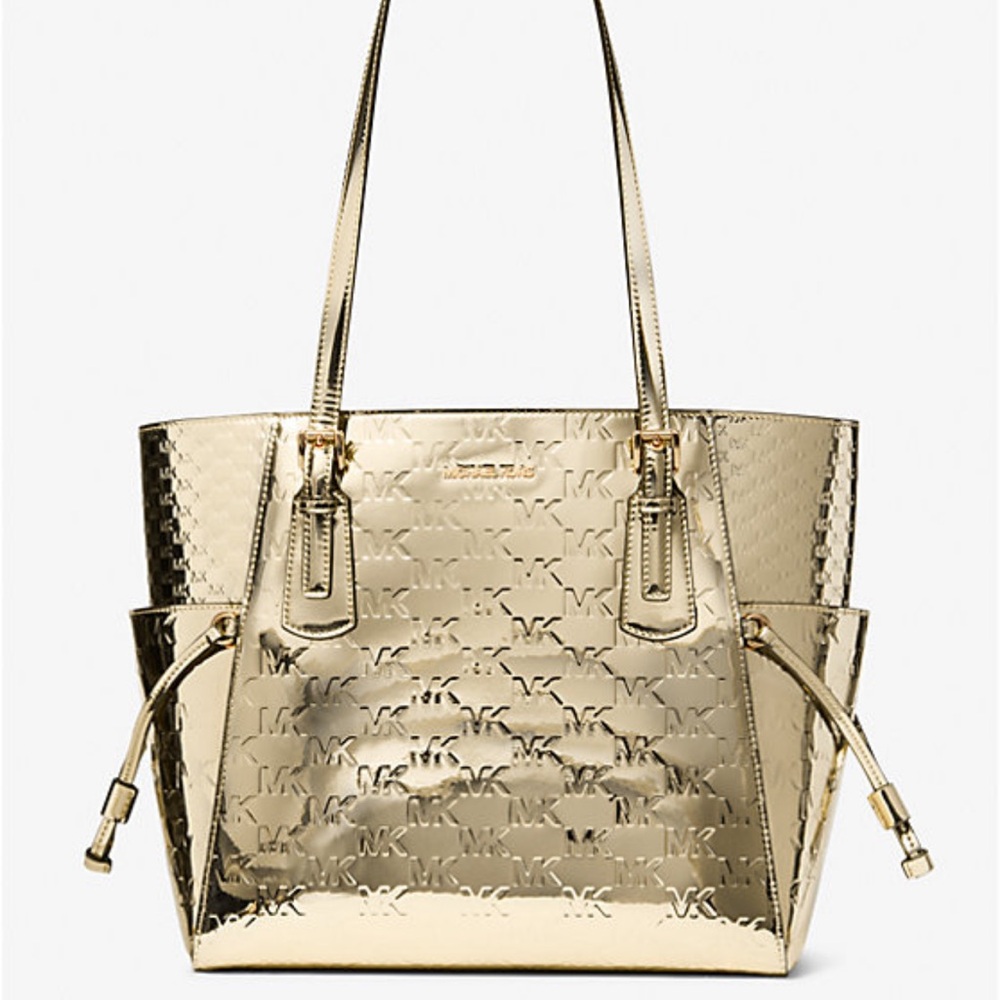 MICHAEL KORS Voyager Lg Metallic Logo Debossed EW Shoulder Tote Bag
Pale Gold